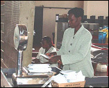 An employee weighting the mail